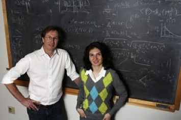 Davoudi and Ph.D. advisor, Prof. Martin Savage, University of Washington, Fall 2012. Photo credit: Seattle Times.