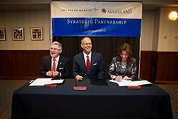 Patrick O'Shea, Ray Johnson and Mary Ann Rankin sign the memorandum of understanding to establish the Quantum Engineering Center at the University of Maryland. Photo: John Consoli